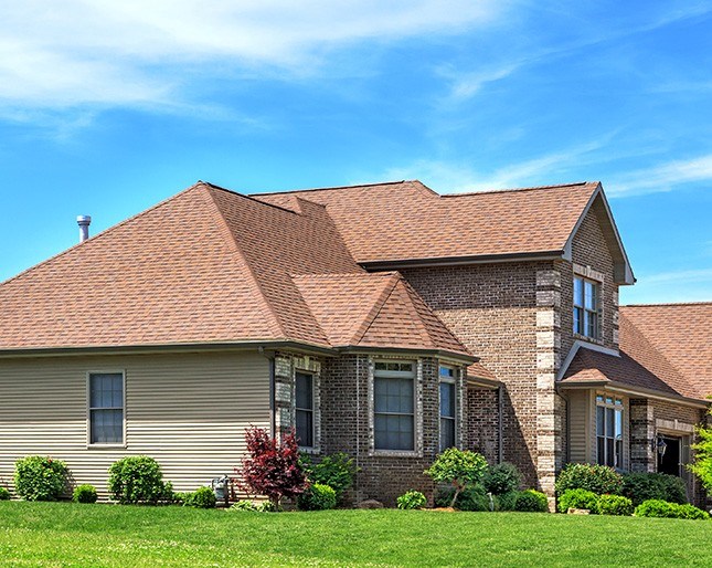 Brown asphalt roofing system on home in Columbus, OH