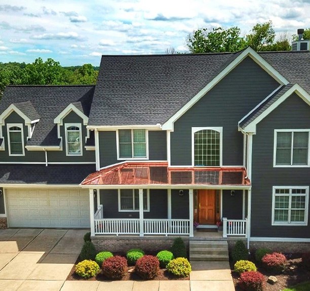 Asphalt and copper roofing system on Ohio home