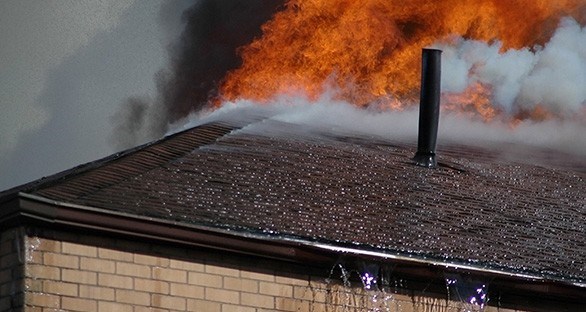 Burnt shingles caused by house fire in Columbus