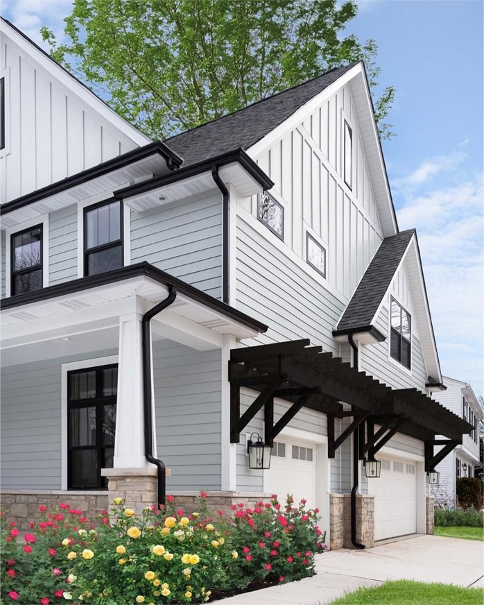 Repalcement vinyl siding on two-story home